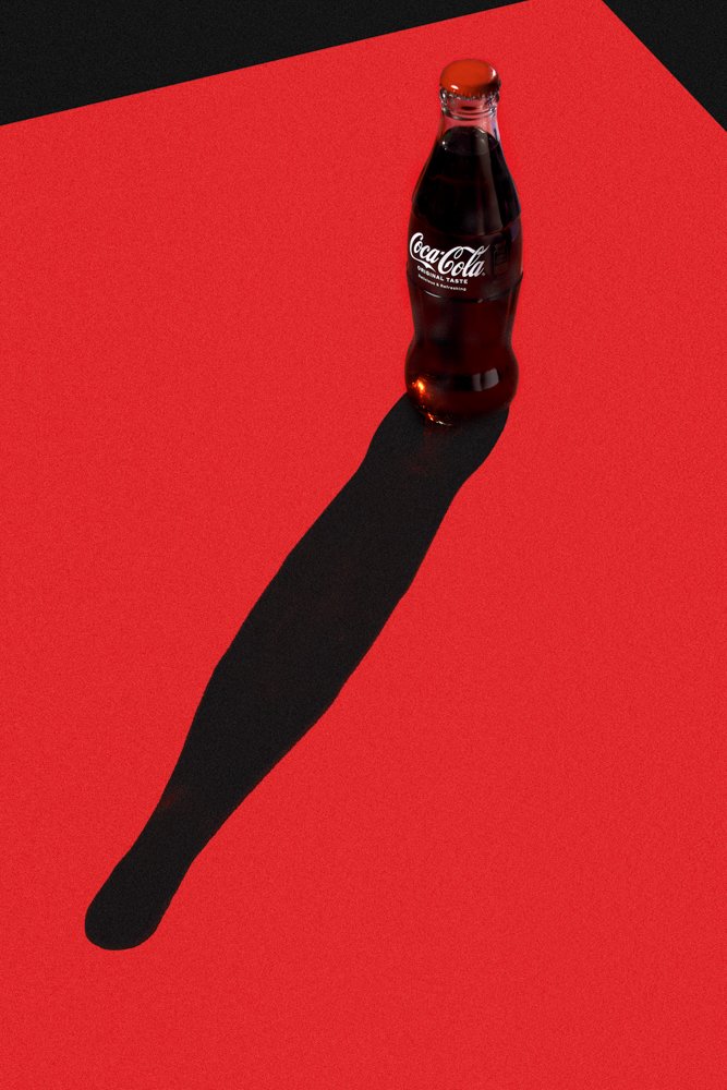 Glass bottle of Coca-Cola Original Taste casting a long shadow on a red background