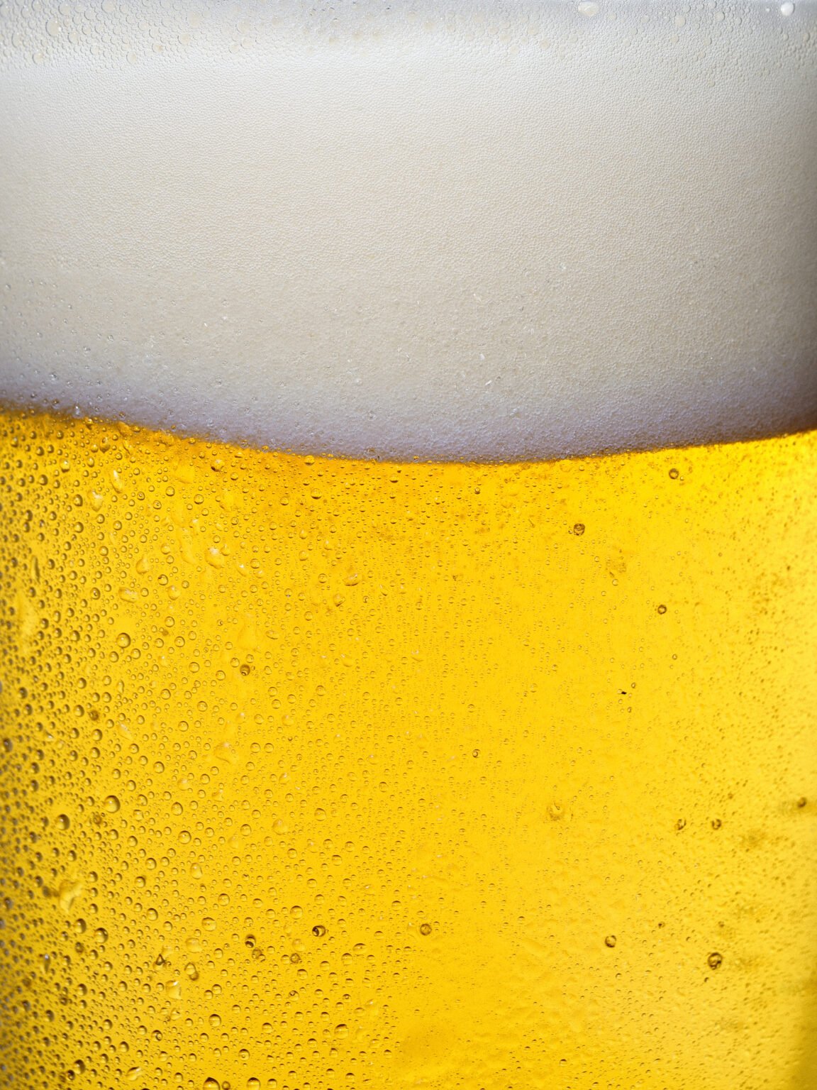 a perfect macro shot of a pint of beer by commercial photographer scott choucino