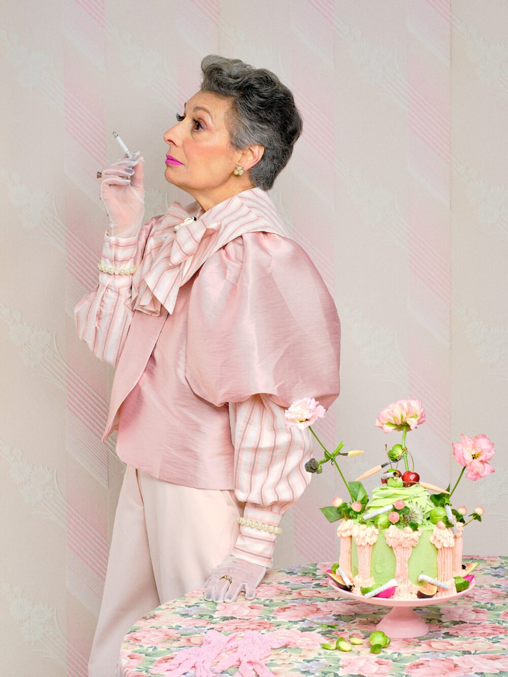 vintage portrait of a lady smoking with a very pink set