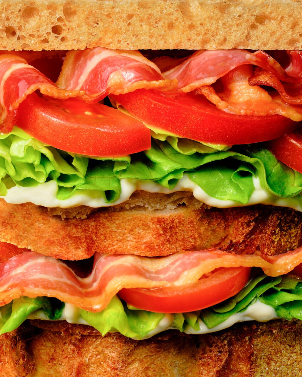 food photograph of a close up of a BLT sandwich made by a pro food stylist