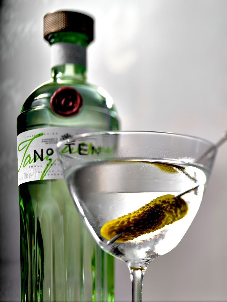 Tilt shift 90s style photographer of a Tanqueray number 10 gin martini by Scott Choucino